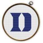 Duke Blue Devils Logo Counted Cross Stitch Pattern - Download in PDF 2 Duke Blue Devils logo cross stitch pattern shown in embroidery hoop