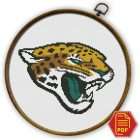 Jacksonville Jaguars Logo Counted Cross Stitch Pattern - Download in PDF 1 Jacksonville Jaguars logo counted cross stitch pattern shown in an embroidery hoop with PDF download badge