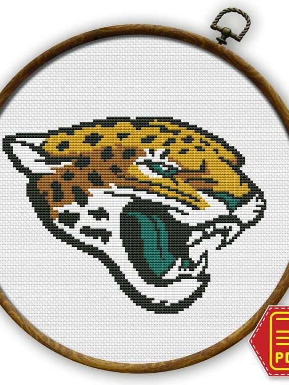 Jacksonville Jaguars logo counted cross stitch pattern shown in an embroidery hoop with PDF download badge